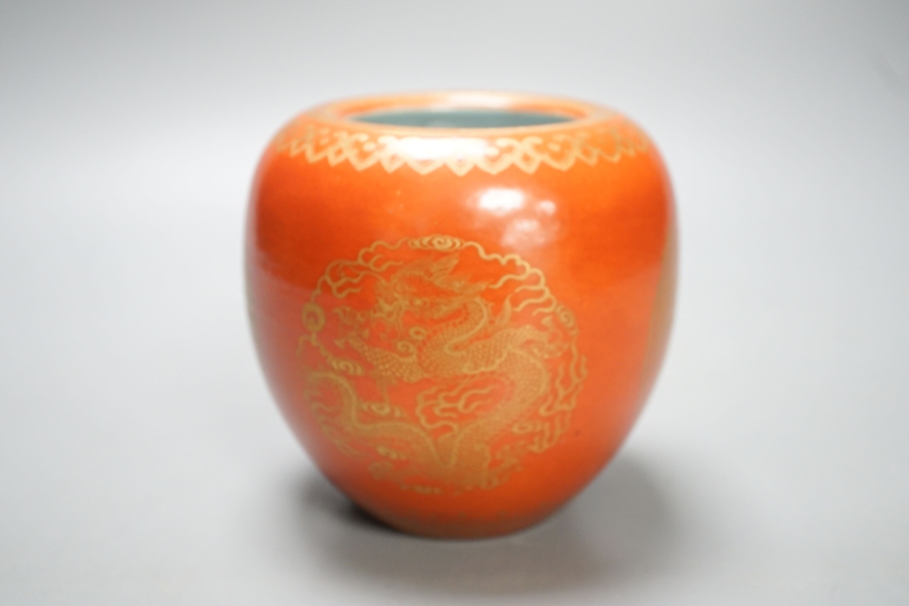 A Chinese coral ground brushwasher, with gilt phoenix design 11cm